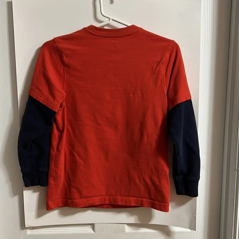 Gymboree size 10 boys Snowboard orange long sleeve shirt.